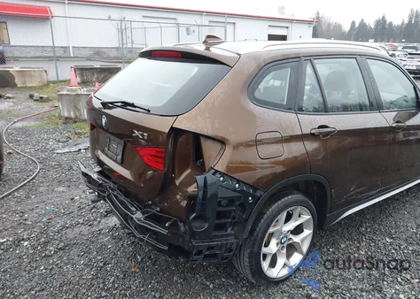 2015 BMW X1 xDrive28I z USA, uszkodzony, nr VIN WBAVL1C5XFVY41472